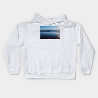 Sky reflections on wet sand Kids Hoodie